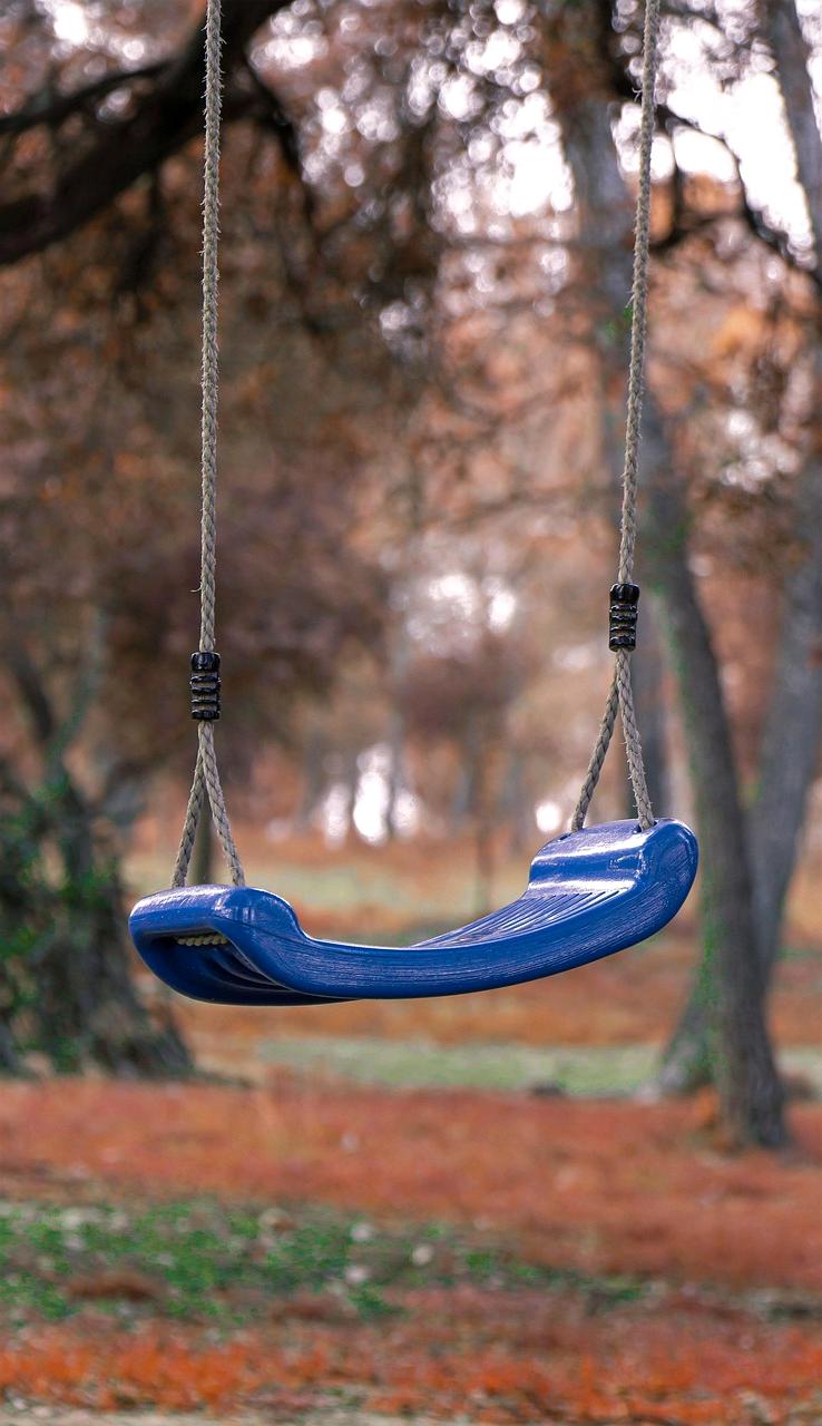 Fresh vegetables, fruits and healthy ingredients arranged on a wooden table representing systemic lifestyle approach
